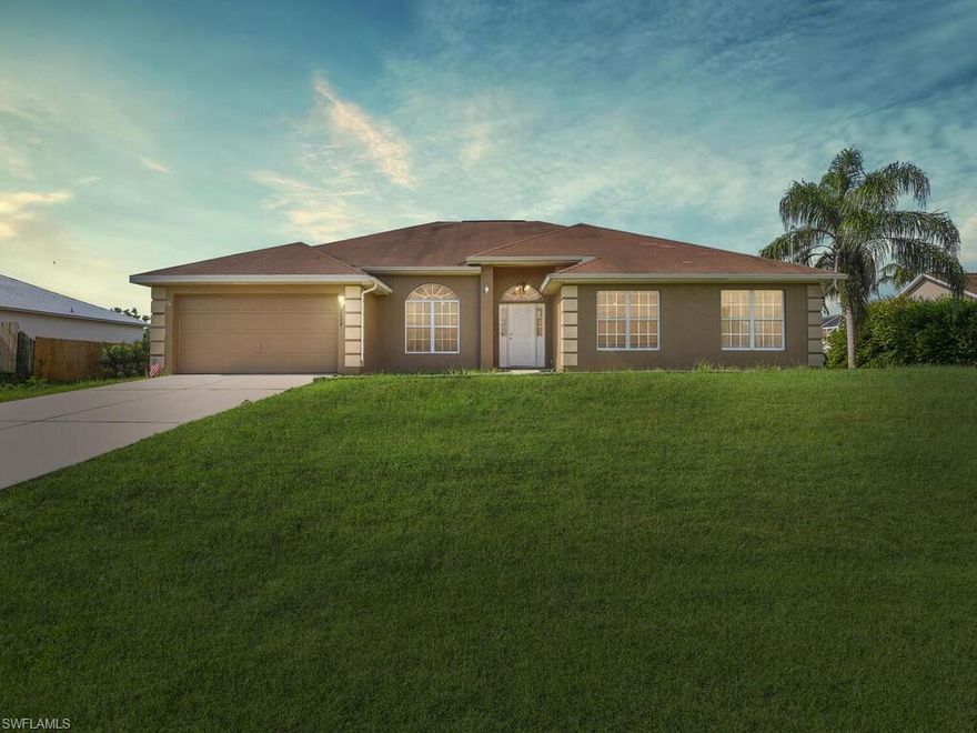 Don't miss this opportunity to own this Big  4 bedrooms, 3 bathrooms on the TRIPLE LOT with SOUTHERN REAR EXPOSURE and all  Assessment PAID,  Located in the very desirable SW Cape Coral area on a nice street across from waterfront homes.  Home with perfect layout for entertaining friends and family. Close access to Restaurants, Schools, shopping, nightlife and parks. You will not find a triple lot home with paid assessments at this price in this SW area