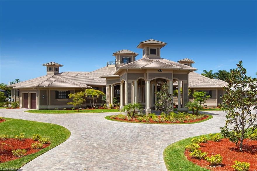 Majestically situated on one of Marco's largest tip lots, this newer (2014) custom-built, one-story home offers over 10,000 square feet of living area. Just shy of 6,000 square feet is under air. Newer (2014) seawall and dock. A chef's dream kitchen comes equipped with two Sub-Zero refrigerators, two dishwashers and Wolf appliances that include a six-burner gas cooktop. Expansive vaulted ceilings throughout home, eight-person movie theater. The owner's suite offers two designer closets and its own second laundry room. For the car lover, there are two three-car garages at both ends of home. Outdoor living area offers a hot tub and waterfall feature in the open-air pool. Beautiful water and light features add to this spectacular home, outdoor fireplace, built-in grill and kitchen area offers tons of storage. Electric screens and shutters. There are too many features to list. Owner is Agent.