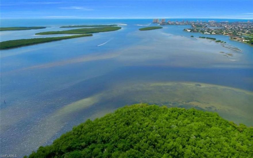 Largest Lot with Best View on Key Marco all the way to the Gulf of Mexico with over 1.3 Acres enjoying endless sunsets over the Gulf of Mexico & Marco island skyline