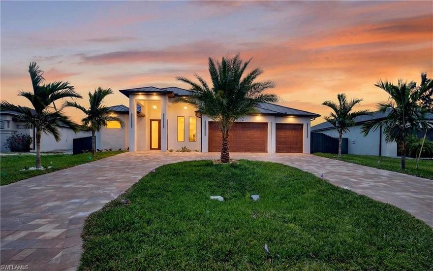 Step into your private tropical retreat in the heart of Southwest Cape Coral. This exceptional 4-bedroom, 4-bathroom luxury pool home offers over 2,400 square feet of refined living, designed to deliver a true resort-style experience every single day.

From the moment you arrive, you’re greeted by elevated finishes including sleek porcelain flooring, custom carpentry, and fully built-out closets, all curated to blend modern elegance with effortless comfort.

The primary suite is a sanctuary of its own, featuring a spa-inspired dual walk-in shower that evokes the feeling of a five-star resort—designed for relaxation, privacy, and indulgence.

But the true showstopper is the outdoor oasis.

Step outside to your fully automated heated pool and spa, where luxury meets technology. Control the temperature, ambient lighting, jets, and cascading waterfall features right from your phone and transform your backyard into a personalized paradise at any moment. Surrounded by lush tropical landscaping and swaying coconut palms, this space delivers unmatched privacy and a serene, vacation-like atmosphere.

Whether you're hosting unforgettable gatherings or enjoying quiet sunsets, the expansive pool deck and outdoor kitchen create the ultimate setting for seamless indoor-outdoor living—where every day feels like a getaway.

Crafted with both beauty and durability in mind, the home also features a metal roof, city water, and all assessments paid, offering long-term value and peace of mind.

Perfectly positioned near the highly anticipated Seven Islands Project and Cape Coral Grove, you’re not just buying a home—you’re investing in the future of one of Cape Coral’s most exciting and rapidly growing areas.

This is more than a home—it’s a luxury lifestyle defined by water, sun, and serenity.

Schedule your private showing today and experience it for yourself.