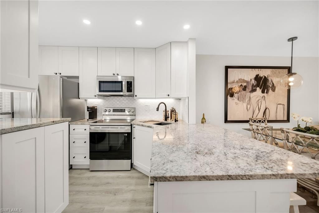 Photo of 290 Banyan BLVD #290, NAPLES, FL 34102 (MLS # 225059300)