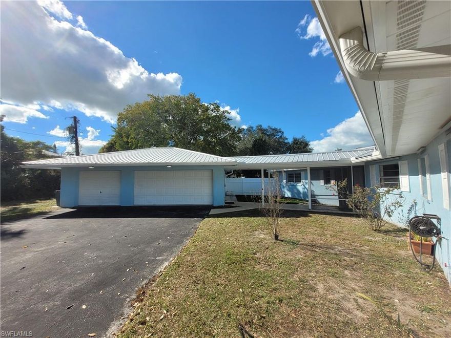 Wonderful riverfront retreat in the heart of historic Bonita Springs. Enjoy a front-row seat to nature with frequent sightings of dolphins, manatees, manatees, and native wildlife, along with graceful water birds passing by like a living painting. This exceptional property offers expansive 180+ degree views of the river, mangroves, and surrounding natural beauty.

This 2-bedroom, 2-bath home features a private dock with lift and direct Gulf of Mexico access—ideal for boating enthusiasts. Inside, you’ll find a cozy fireplace, a remodeled kitchen and bathroom, and a functional layout with incredible potential to personalize or expand. Additional highlights include a metal roof (approx. 9 years old), AC system (approx. 2 years old), and a spacious three-car garage.

Tucked away on a quiet cul-de-sac within a private subdivision, this location is truly unmatched. Riverside Park is just steps away, offering art shows, food trucks, restaurants, bars, and live entertainment right at the end of the street.