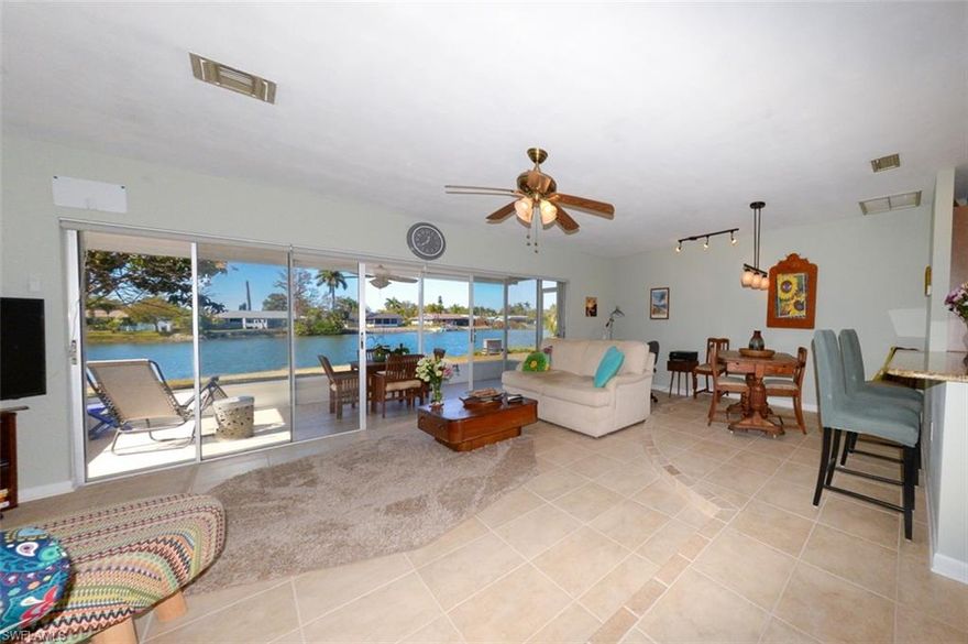 Pristine Lake Views. Stunning Sunsets. Total Peace of Mind.
Welcome to this beautifully maintained and thoughtfully updated lakefront retreat, where everyday living feels like a getaway. This charming home offers 2 spacious bedrooms, 2 full baths, and an oversized 2-car garage, all set on an oversized lot with ownership to the center of the lake.
The heart of the home is the gorgeous, updated kitchen, featuring new wood cabinets with soft-close doors and drawers, pull out drawers, granite countertops, a breakfast bar, and an open layout that flows seamlessly into the great room. Tile flooring throughout, new windows throughout, and impact glass in the kitchen enhance both style and comfort.
Recent upgrades provide peace of mind, including a new roof (2023), Florida impact-rated garage door (2023), seamless gutters and downspouts (2023), new range (2023), newer HVAC (2020), and new water heater (2025). Accordion hurricane shutters add extra protection.
Step into the spacious great room, where 16 feet of sliding glass doors open to a new covered and screened lanai, perfectly framing breathtaking lake and sunset views. The screened front entry lanai adds even more outdoor living space. There’s plenty of room for a pool and spa, making this home ideal for entertaining or relaxing in your own private oasis.
Located in the highly desirable Iona/McGregor area, this home sits on a serene 15-acre lake teeming with wildlife—ducks, herons, fish, turtles, white pelicans, and more. Best of all, NO HOA fees.
Just minutes from the white-sand beaches of Fort Myers Beach and Sanibel Island, plus top-rated restaurants, shopping, theaters, golf courses, hospitals, and RSW International Airport. You’re also within 10 miles of the vibrant Downtown River District, offering unique shops, dining, live music, art festivals, and nonstop entertainment.
Beautifully updated. Move-in ready. Lakefront living at its finest—this one is ready for YOU.