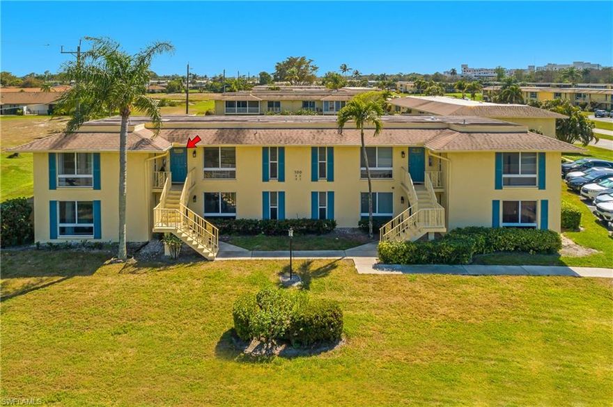 READY TO START ENJOYING YOUR LIFE? ENJOY RESIDING IN A COUNTRY CLUB AND PLAYING GOLF WITH NO EXTRA FEES at this BUNDLED GOLF COMMUNITY! Play 2 golf courses with pro shop on site, with tons of amenities, and less than 3 miles to 5th Ave and Naples Beach! There are also 2 Publix shopping centers with additional Dining and Shopping (even a movie Cimena) within walking distance (one off Davis Blvd and the other off Tamiami Trail E)!
This 2nd floor end unit boast privacy, its located in a quiet section of the community with no immediate neighboring buildings on either side and offers Lovely Lake and Sunset views from the Lanai! This Open Floor Plan with Split Bedrooms features IMPACT WINDOWS & DOORS throughout, a wide kitchen window which offers natural light, GRANITE COUNTERTOPS, a WINE COOLER and New PORCELAIN TILE WITH THE LOOK OF NATURAL WOOD PLANK FLOORING THROUGHOUT! There is a large screened lanai off the great room along with a separate open aired balcony off the Master Bedroom! the Master Bedroom is large and includes 2 separate closets, sliders to open aired balcony and the en-suite Master Bath offers an oversized walk-in shower with a double sink vanity. Unit offers a newer HVAC System replaced on 12/13/21, Newer Washer, Dryer and Dishwasher! Unit also has an exterior storage closet - perfect for pool/beach toys!
Glades Golf & Country Club includes a Clubhouse, "The 19th Hole" Dining with bar area (which has had some recent renovations), 2, 18-Hole golf courses (par 70 and par 55), the Palmetto and The Pines Course, a pro-shop, 6 recently Refurbished Har-Tru Clay Tennis Courts,  9 pools with Resort-Style Main Pool at Clubhouse with Waitstaff Service, a new 12 court Lighted Pickleball Complex and Social Area, Fitness Classes, Art Room, Library and all located less than 3 miles from beach, 5th Ave, Tin City and the Naples Pier! Pet Friendly Community allows 1 pet up to 25 lbs!