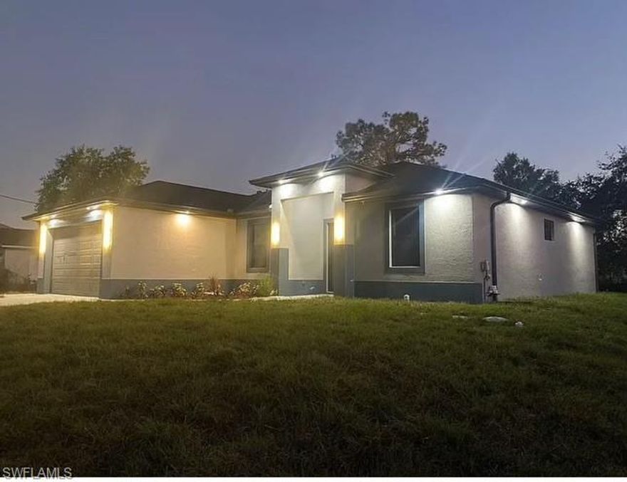 Brand-new construction offering 3 bedrooms plus a versatile den and 2 bathrooms, designed with modern features and quality finishes throughout. This home includes lanai, impact-resistant windows and doors with SBT 70 type interlayer glass, 9-foot interior ceilings, and 10-foot high soffits for an open and comfortable feel. Additional features include a complete gutter system, irrigation sprinkler system, surge protection, reverse osmosis water system, ceiling fans, and built-in laundry room cabinets. The property also comes equipped with a pre-installed camera and speaker network, stylish chandeliers, insulated garage, and modern A/C vent grills for enhanced comfort and efficiency. Conveniently located with easy access to Lee Blvd, Gunnery Road, and Buckingham Road, providing quick connections to shopping, schools, and major commuting routes. A move-in-ready home that combines modern design, quality construction, and an excellent location.