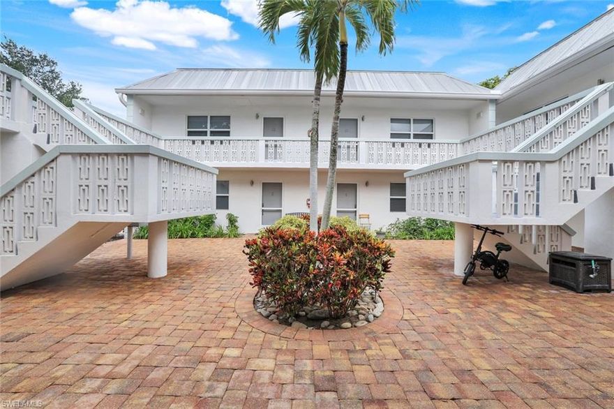Discover the ultimate vacation retreat in this charming 1-bedroom, 1-bathroom corner-unit condo, perfectly nestled in the highly sought-after Twin Palms complex. Located on the second floor, this beachy oasis offers privacy and tranquility just a short stroll from the white-sand beaches of Naples and the Gulf of Mexico. It’s also steps away from the vibrant dining, shopping, and entertainment of 5th Avenue South and 3rd Street South. Fully furnished with chic and comfortable décor, this cozy retreat is part of an intimate community of just 12 units. Enjoy the charming central courtyard, perfect for relaxing after a day of exploring. One assigned parking space ensures convenient access throughout your stay. Whether you’re taking a 7-minute walk to the beach, savoring world-class dining, or unwinding in this peaceful haven, this property captures the quintessential Old Naples lifestyle. With its prime location and timeless charm, it’s the perfect choice for a relaxing getaway! Book your stay and experience the best of Naples!
