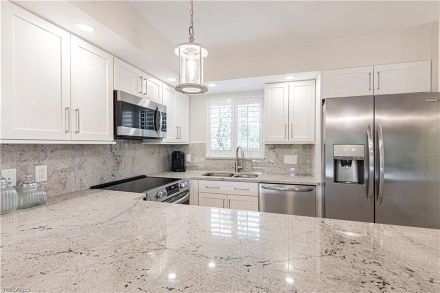 Ultimate sophisticated elegance awaits you upon entering a stunning executive one bedroom rarely available End unit.  Sleek pastel grey tones accentuates new granite island style counters   Gorgeous kitchen cabinetry Bathroom is exquisite  latest state of the art craftmanship    SELLER OFFERS TO PAY A PORTION OF THE $40,000 SOCIAL MEMBERSHIP INITIATION FEE UPON SATISFACTORY CONTRACT.  This condo is offered Turnkey furnished as End unit with plantation windows.   Newer screened-in lanai overlooking renovated driving range /chipping practise area..
Prestigious Eagle Creek Country Club is a Larry Packard golf course refined by Ken Venturi who assisted in early devlopment phase.  Tours of golf course can easily be arranged .  Unit can be leased as income producing property.