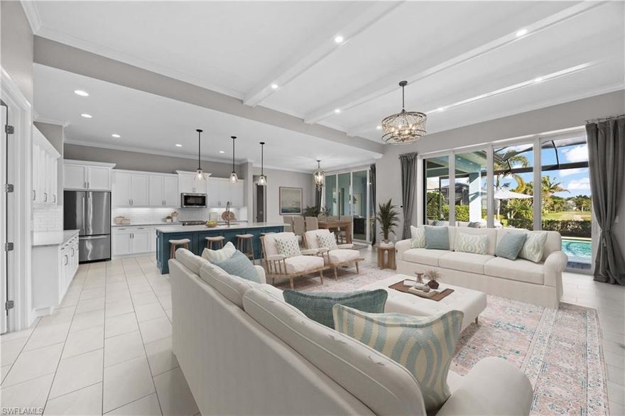 Welcome to exceptional lakefront living in the desirable Sparrow Cay neighborhood of Naples Reserve! This beautifully maintained 4-bedroom + Den, 3.5-bath home built in 2018 offers 2,669± sq ft of thoughtfully designed living space and sits on a generous lakefront homesite. Designed for both everyday comfort and entertaining, the open floor plan features abundant natural light, high ceilings, and seamless indoor-outdoor connectivity. The main living area opens to a spacious screened porch with a custom outdoor kitchen, overlooking your private saltwater pool and spa — the perfect setting for year-round Florida living.
Interior features include impact-resistant doors and windows, designer finishes, and a modern layout ideal for guests or family.
Nestled within the amenity-rich, resort-style community of Naples Reserve, residents enjoy a premier lifestyle with access to a lakeside clubhouse and resort-style pool, tiki bar/restaurant, tennis and pickleball courts, fitness center, children’s play area, dog parks, scenic walking/biking paths, and more. Ideally located just a short drive to shopping, dining, and the white-sand beaches of Naples and Marco Island, this home is the perfect blend of comfort, style, and convenience.