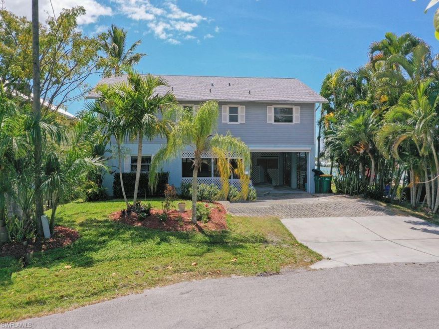 Live the Florida lifestyle in this "Old Florida" style home with deep water, direct Gulf access. Open floor plan with great room, pocketing sliding glass doors, lanai on lower level and huge screened deck on upper level for additional living space. Fabulous water views! Air conditioner installed in 2014 and New Roof & screens 2018. Dock with fish station & 12,000 lb. covered lift. World class fishing in the Ten Thousand Islands and pristine beaches in just minutes. Goodland offers 2 marinas, 2 county parks & several restaurants. Street legal golf carts are permitted.  Price is firm.