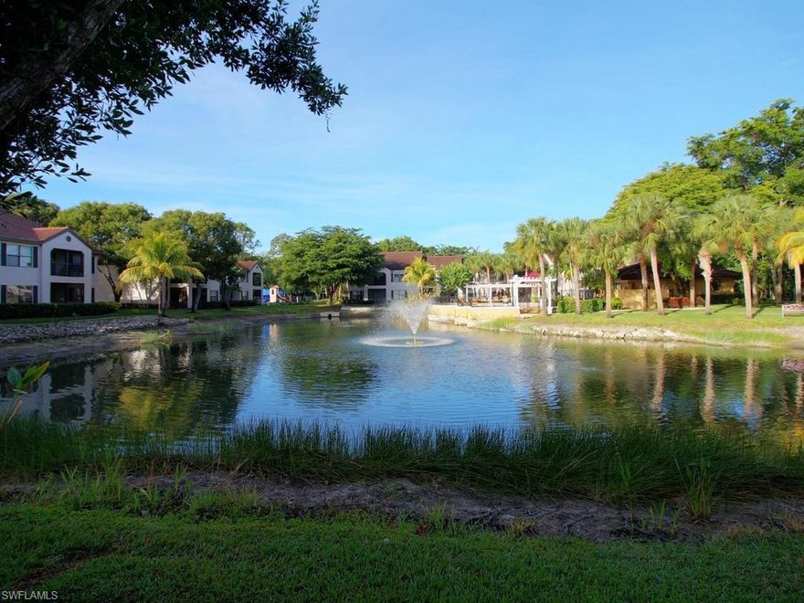 E-Z-2-C!  Fantastic location in a tranquil paradise at the Oasis! This welcoming second story condo with  a great lake view and vaulted ceilings has the largest floor plan in the entire complex.  An airy open concept great room with screened porch overlooking the lake and clubhouse pool.  You’ll appreciate the walk-in master closet, full-size laundry room,  breakfast bar and kitchen pantry.  The Oasis has two sparkling pools with sundecks, hot tub/spa, two fitness centers, fully appointed community clubhouse, tennis courts, children’s outdoor playground and lush tropical landscaping throughout with six scenic lakes. It’s ideally located just SW of the intersection of Airport and Orange Blossom in North Naples and is conveniently close to shopping, fine dining restaurants, movies, Public Library, YMCA, Regional Park and the white sandy beaches of Naples. Naples' best schools, Barron Collier High, Pine Ridge Middle and Pelican Marsh Elementary.  It’s a perfect year-around-home, winter retreat or great investment property… this attractively affordable residence has low condo fees! Call now to schedule a private showing and fall in love! Ready for quick occupancy!