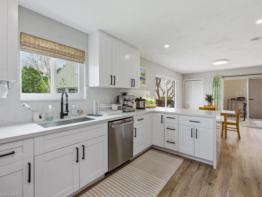 Photo of 438 Bristle Cone LN #20, NAPLES, FL 34113 (MLS # 226014800)