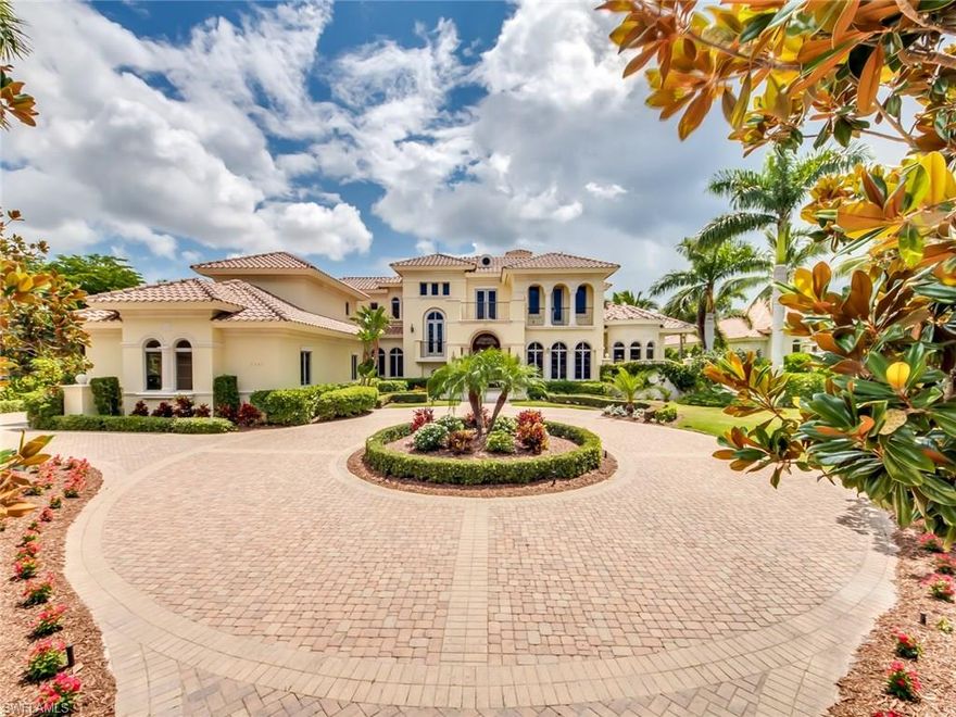 Exceptional opportunity to purchase this luxurious custom estate home in sought after Isle Royale within the gated enclave of Grey Oaks.  This grand home is comprised of 5 full bedrooms and 6.5 baths,   two story open living room with fireplace, oversized family room off kitchen,  wine cellar, butlers pantry, private theatre, home office, Nanny or in-law suite, and bonus room.   The home offers a circular drive leading to 3 attached and 1 detached garage spaces.   The interior features include custom millwork, elevator, steam shower, oversized gas range, double sub zero refrigerators, and ice maker.    The luxurious master suite offers two private baths, separate closets and wet bar.   Enjoy the expansive lake and golf views from the oversized open lanai with outdoor kitchen and fireplace.  Relax in the resort inspired pool and spa with water features.