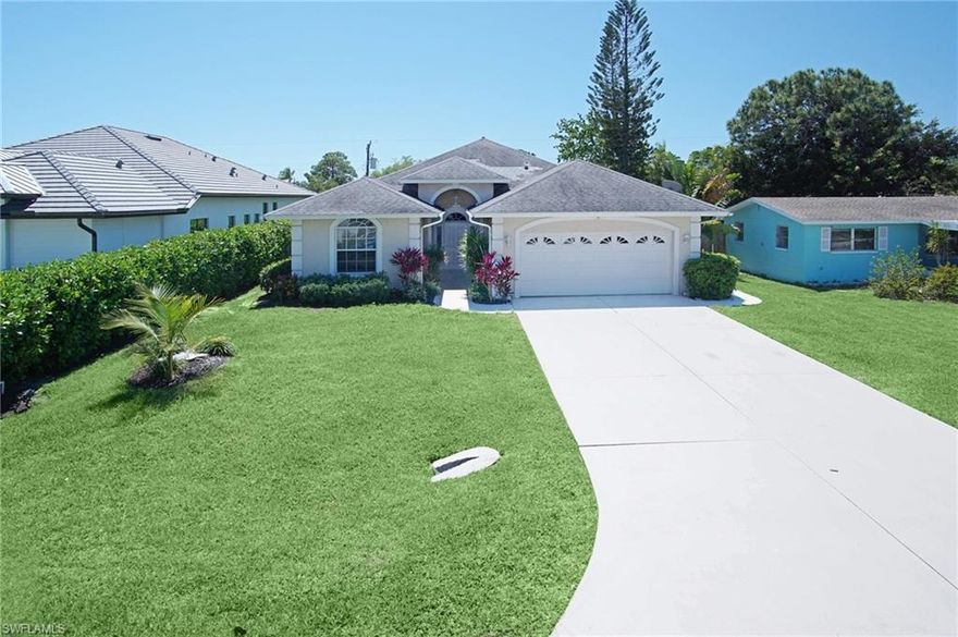 This home features an open concept with sight lines from the kitchen to the great room/dining area with neutral paint, tray ceilings and crown molding throughout.  The light and bright kitchen is perfect for entertaining and spending time with family gathered around the large counter seating area..  Recent updates include kitchen cabinets, updated lighting, quartz counters,luxury vinyl in the bedrooms and stainless steel appliances. The AC, washer, dryer and dishwasher are only a year old.  A coveted Southern Exposure allows you to enjoy the continuous natural light inside with prime sun over the screened pool area. Bonita Shores is west of 41, in Collier County and has no mandatory HOA fees and offers a community boat launch (small annual fee).  The location of the home is only 1-1/2 miles to the beach with quick access to shopping, restaurants and the airport.