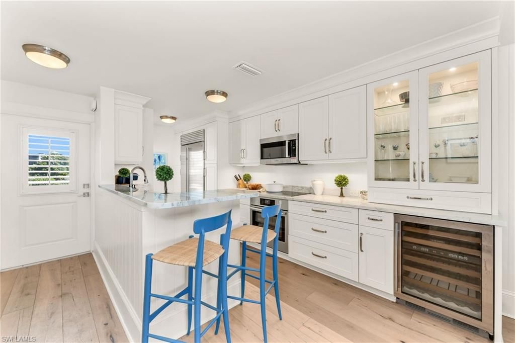 Photo of 2121 Gulf Shore BLVD N #206, NAPLES, FL 34102 (MLS # 225072917)