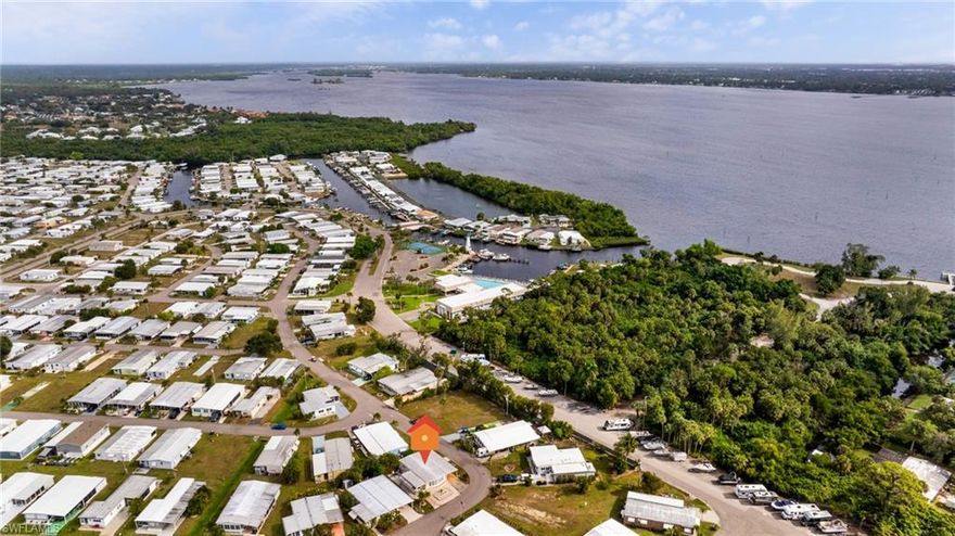 This well-maintained corner-lot home offers comfortable living in the active 55+ gated community of Old Bridge Village. Featuring two bedrooms, two full bathrooms, and a spacious, light-filled living and dining area, the layout is both functional and inviting with plenty of storage.  This home is being sold Turnkey.  Recent improvements include a newer roof, new flooring, updated cabinets, and an updated primary bath, creating a move-in-ready interior. An expanded Florida room provides versatile additional living space, ideal for relaxing or entertaining year-round.  Enjoy the beautiful Florida weather on the secluded patio and the convenience of being just a short walk to the expansive new pool and hot tub at the clubhouse. Experience nine acres of natural beauty at the Palm Point waterfront area, complete with a fishing pier, picnic tables, tiki huts, and spectacular views of the river and downtown Fort Myers.  The community offers an exceptional lifestyle with a Gulf-access marina, boat slip rentals, and a full calendar of social activities. Additional amenities include a workout center, pickleball courts, bocce, shuffleboard, and tennis—bringing resort-style living right to your doorstep.  Schedule your showing today and discover your own “Peace” of Paradise.