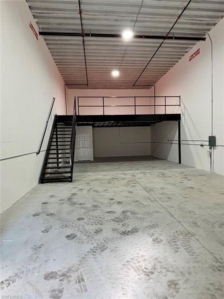 JUST ADDED Epoxy floors!Discover an exceptional luxury Toy Vault located in beautiful Fort Myers, Florida—just north of Naples and only one mile south of Alico Road. This premier storage condo offers the ideal venue for your storage, collection, and entertainment needs, whether for motorcycles, sports cars, boats, RVs, or other prized possessions.
Fully customized by the owner with top-quality finishes, this unit features a 500 sq. ft. $32k built-in mezzanine , automated roll-up door, 50-AMP plug, half bathroom, and solid concrete construction throughout. The facility is hurricane-rated, climate-controlled, gated, WiFi-ready, and secured with 24/7 cameras plus daily armed guard security for maximum peace of mind. Residents also enjoy access to a shared clubhouse, low CAM fees, and a prime location just minutes from both RSW Airport and Page Field. Dimensions include a 25’ x 60’ main floor and a 25’ x 20’ mezzanine, offering generous room for storage and entertainment. A rare opportunity—there’s truly nothing else like it in the area!