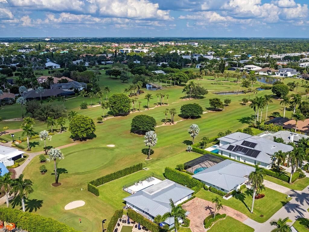 Photo of 595 Wedge DR, NAPLES, FL 34103 (MLS # 225077204)