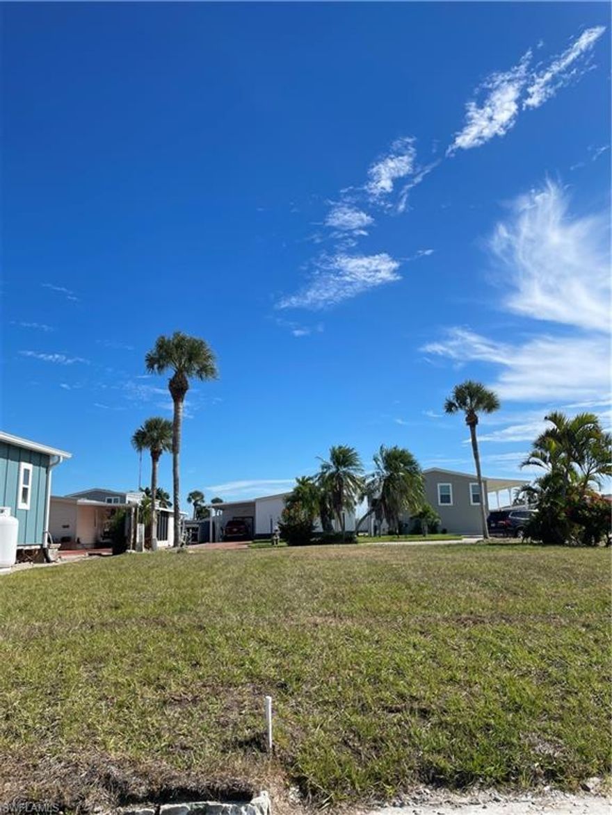 Build your dream home or investment property on this beautiful canal-front lot located in the desirable Bayside Estates, a welcoming 55+ community just 2.5 miles from Fort Myers Beach. Enjoy the best of Florida living with direct canal access to the Gulf—perfect for boating enthusiasts—and the option to bike to the beach, restaurants, and local attractions to experience the relaxed Fort Myers Beach lifestyle. Bayside Estates offers low HOA fees and a variety of resort-style amenities, including a heated community pool, tennis and bocce courts, clubhouse, and year-round social events. Conveniently situated near shopping, dining, and marinas, this property offers both comfort and convenience in a vibrant waterfront setting. Don’t miss this opportunity to create your own slice of paradise in one of Southwest Florida’s most sought-after 55+ communities.