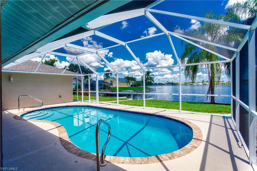 Waterfront Pool Retreat on Lake Kennedy | Furnished Short-Term Rental | Travel Nurses Welcome. NO FLOOD ZONE | Furnished | Flexible Lease Terms Available. Welcome to your private slice of Southwest Florida paradise a beautifully remodeled 4 bedroom, 3 bath waterfront pool home with two master suites, perfectly designed for vacationers, traveling professionals, and extended-stay guests. Set directly on Lake Kennedy with access to the famous Chain of Lakes, this fully furnished retreat offers the ideal blend of comfort, convenience, and resort-style living. Whether you're a traveling nurse on assignment, a snowbird escaping winter, or a family seeking a relaxing getaway, this home delivers space, privacy, and unforgettable views. Home Features 4 Bedrooms, 3 Bathrooms, 2 Master Suites, Fully furnished & turnkey, driveway parking, NEW roof (2022), Hurricane impact windows & doors, Granite countertops & solid wood cabinetry, Plank tile flooring throughout (no carpet), Coffee bar + wine fridge for entertaining, Indoor laundry, Modern coastal décor. The open great-room layout creates an airy flow between kitchen, dining, and living areas, with stunning lake views from multiple rooms. Outdoor Lake Life Living at its Best. Step outside to your screen-enclosed private pool and lanai, perfect for morning coffee or sunset cocktails. Enjoy Private seawall + dock, Boating, jet skiing, kayaking & paddleboarding available, Fishing from your backyard, Gorgeous sunsets over the water, views of Sunrise & music from Sun Splash Family Waterpark. This is true Florida indoor-outdoor living perfect for vacation & seasonal stays, traveling nurses & medical professionals, corporate housing, relocation housing, Snowbirds, Family gatherings, Room rentals (dual master layout ideal for shared stays), split-bedroom design allows privacy for multiple guests or roommates. Prime Location minutes to Shopping & dining, Hospitals & medical centers, Beaches, Parks & trails, Downtown Cape Coral entertainment, Everything you need yet peaceful waterfront serenity at home. Rental Options with flexible terms available Weekly, Monthly, Seasonal, Furnished long-term, Room rental potential Inquire for pricing & availability. Your Florida Escape Starts Here. Wake up to lake views, spend your days on the water, and relax poolside at sunset. This isn’t just a rental it’s a lifestyle experience. Paradise is waiting.