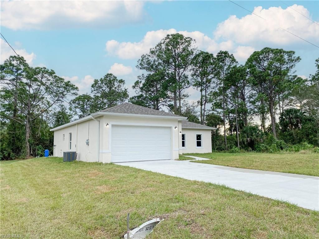 Photo of 1024 Bagget ST E, LEHIGH ACRES, FL 33974 (MLS # 225076384)