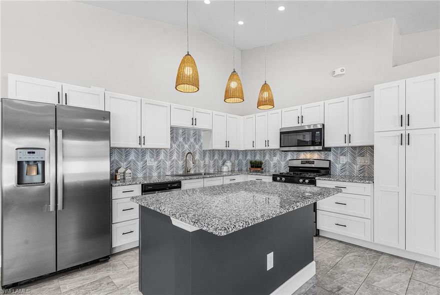 Welcome to this charming 2 bedroom, 2 bathroom, attached villa located in Labelle City Village. This attached villa is offering the perfect blend of comfort and low maintenance living.  Step inside to find a bright, open floor plan featuring a spacious living area with plenty of natural light and neutral finishes throughout. The kitchen boasts modern appliances, ample cabinet space, and a convenient breakfast bar, ideal for everyday living or entertaining guests.  The primary suite includes a walk in closet and a en-suite bath, while the guest bedroom and second full bath provide plenty of space for family or visitors.  Additional highlights include in-unit laundry and a attached garage.  Move in Ready and waiting for you to call it home!