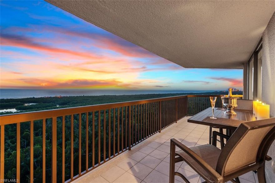 Dramatic Gulf views surround this totally renovated 14th Floor Dorchester residence in Pelican Bay in the rarely available and highly desired 02 building stack. It features an oversized wrap-around balcony showcasing stunning unobstructed views of Clam Pass and the Gulf Coast as far as the eye can see. Upgrades include new widened impact glass sliders, fine wood flooring, custom bathroom and kitchen cabinets, raised ceiling and Den floor, Crema Marfil marble and Jacuzzi tub in master. The open kitchen is luxuriously finished with Taj Mahal counters and high-end appliances to complete the soft transitional style. The sweeping view extends to master and guest suites, each with access to the expansive balcony. Current Den easily converts to 3rd Bedroom. Dorchester Amenities include two guest suites, pool, spa, grill area, on-site management and parking garage with separate lobby. Recent 3.5 million renovation of the Fitness Center, Club Room and all Common Areas. Residents enjoy the unrivaled benefits of Pelican Bay Amenities-private beach access, two beach clubs and restaurants, sailing, kayaking & tennis. Dorchester is ideally located with beach tram stop just outside the rear door!