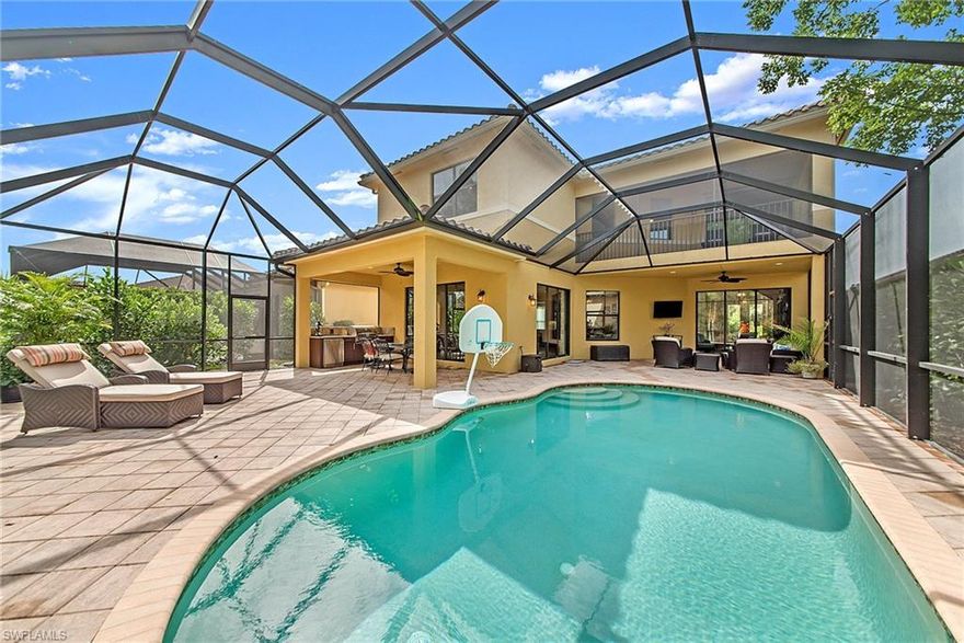 Exceptional Shiraz floor plan in RIVERSTONE. Over 4100 sq. ft. home with privacy from a preserve view. Gorgeous natural light with a NW exposure.  This home has 6 bedrooms, 5 baths, formal living and dining room, spacious kitchen with many upgrades including stainless steel appliances with double oven and cooktop, 42” cabinets, granite counters and gorgeous backsplash. Great room has an added slider onto the oversized lanai with extra covered area.  New outdoor kitchen that is fantastic for entertaining. Upstairs you will find a spacious master with a tray celling, his and her walk in closets, his and her bathroom areas , walk-in shower and large tub. Private screened lanai off the master. Second level has beautiful engineered hardwood and downstairs has tile throughout. Other features include crown molding, 3 car garage, upgraded closet doors, new built in mud room cabinetry with room for a refrigerator, upgraded laundry room with custom cabinetry, fantastic lighting and fan package, improved landscaping, and more. "A" rated schools zone. Clubhouse has a fitness center, social hall, resort style pool, lap pool, spa, 5 lighted tennis courts, indoor basketball, game rooms, and more.