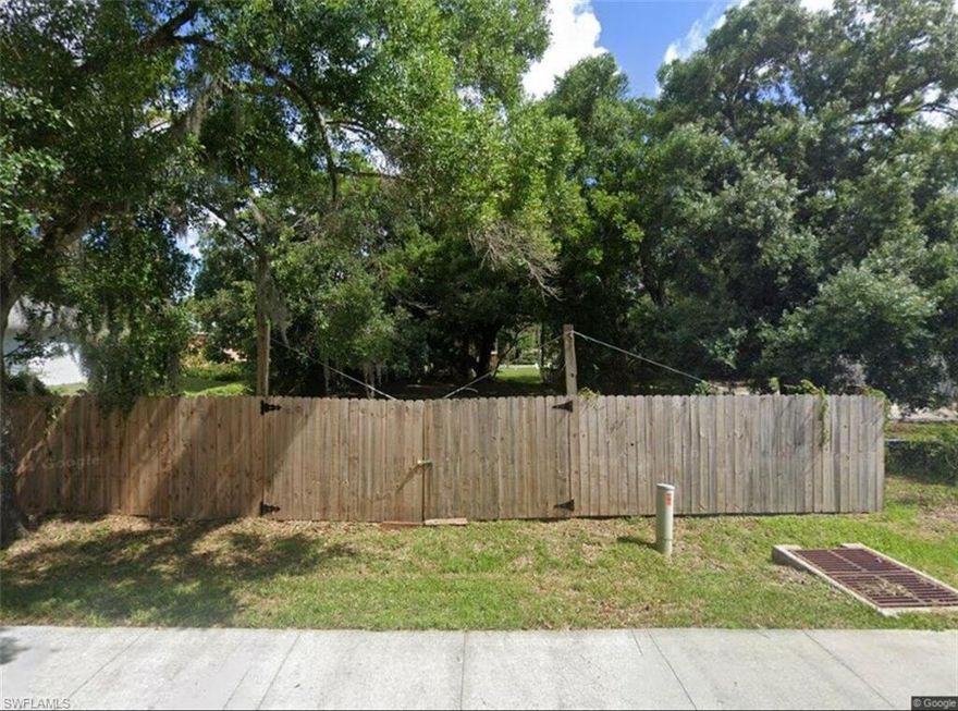 Build your new home or bring a manufactured home to this cleared and fully fenced lot located in Palmona Park, Fort Myers. This 0.12 acre parcel offers privacy, level ground, and convenient access to public utilities nearby. No HOA fees and low taxes make this property ideal for affordable living or investment purposes. Located minutes from US-41, shopping, restaurants, Cape Coral bridges, and downtown Fort Myers. Plenty of space for parking, storage, or outdoor living. Great opportunity in an established neighborhood ready for development or future build.