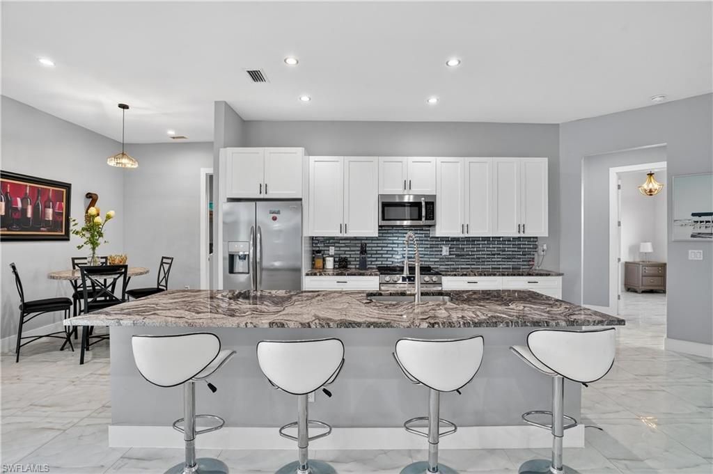 Photo of 2661 43rd AVE NE, NAPLES, FL 34120 (MLS # 226011083)