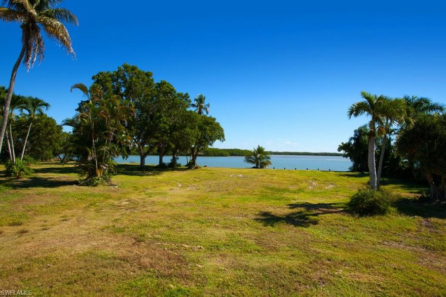 Offering two lots for the price of one, which can be divided. Incredible and rare opportunity to own a one-acre homesite with over 250 feet of Barfield Bay frontage in the prestigious estate section of Marco Island. Offering serene, panoramic views of the bay, area islands, wildlife, beautiful sunrise exposure and immediate, direct access to Caxambas Pass out to the Gulf. Lot is cleared and ready. BIG NEWS- lot has just been rated AE- huge insurance and construction savings.
