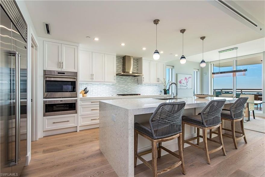 This gorgeous end unit is welcoming with floods of natural light. This 4 bedroom residence conveys a fresh feeling of openness, from the great room to generous walk-in closets and ensuite baths. Seamless interior-to-exterior transitions, with views that stretch for miles through the floor to ceiling windows and doors. Beautifully appointed master suite with a full wall of windows designed to take advantage of the aqua water views.  Crisp white kitchen, equipped with quartz countertops, a massive eat-in island, and Wolf/Subzero appliances. Indulge in the feeling of an all-inclusive resort where the vacation never ends. Kalea Bay has a rooftop pool with sundeck, a full-service club, two restaurants, three pools, and active tennis/pickleball program, and guest suites.