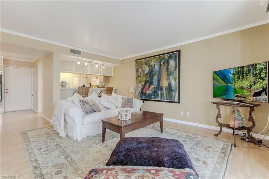 This cozy true 2 bedroom condo is one of Schooner Bay's most popular floor plans. Features include beautiful crown molding, light laminate wood flooring, an interesting nook for many uses, updated kitchen cabinets and bathrooms. The guest bedroom has double pocket doors which open up into the living room and can also be used as an office. This community is North Fort Myers' hidden gem. Amenities include a heated swimming pool, exercise room, sauna, cabana with bbq picnic area, shuffleboard, library, community room, fishing pier, and so much more. Walking distance to waterfront dining. Across the bridge from downtown Fort Myers and shopping. It's the perfect place to live!