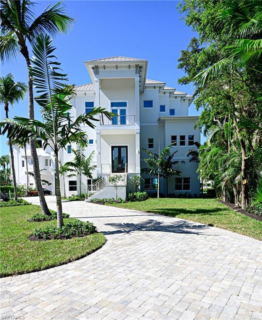 There is no equal to this new Gulf of Mexico home sitting on one of the largest double beach lot sites in Barefoot Beach. The home was constructed using the original concrete pilings/slab and expanded to create this 3 Story home featuring a 2,038 sq ft lanai/deck, electric screens and shutters, massive outdoor kitchen area w/grill, fireplace w/tv overlooking tropical beach garden, pool and the Gulf. This amazing Chef's kitchen w/approx 11'x6' island, 60" Viking range, SubZero refrigerator and freezer, double dishwashers, custom cabinetry w/solid maple boxes, hidden pantry and 2.5" Marble countertops.  3' ceilings, 8' interior doors w/2' transoms, private elevator, 5 full 2 half baths, Great room features wall of 10' sliders to deck, large dining room, 4 bedroom suites with baths plus amazing Master bedroom & bath w/wide Gulf views & supersized closet, 2 laundry rooms, media room and office on the Gulf w/access to the master, media &private bath. 5 car garage  w/42' RV/boat garage, 150' circular driveway, tropical landscaped yard. Boat dock available across the street as a separate purchase (not from Seller). Designer furniture and furnishings package included. Gated plus amenities.