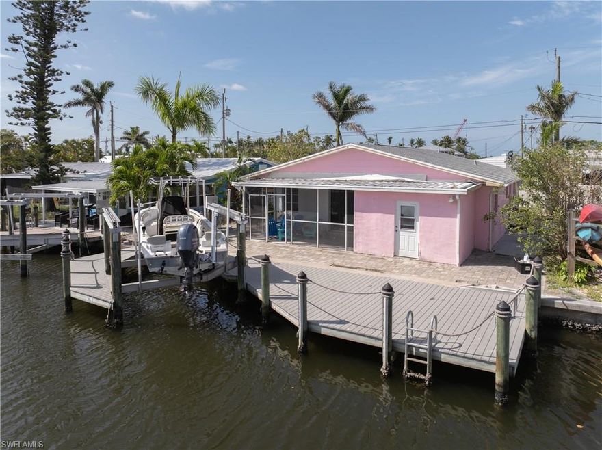Welcome to this opportunity in the charming and colorful fishing village of Matlacha! This waterfront property with direct Gulf access offers the perfect canvas for your coastal dream home. Located just minutes to the open water of Charlotte Harbor and easy boat ride to Cayo Costa, Boca Grande, Sanibel, Captiva, Ft. Myers Beach, all the outer islands and the Gulf waters providing some of the best fishing in all of SW Florida! The composite material dock with boat lift is ready for you to relax and enjoy the gorgeous Florida sunrises or sunsets!! This property provides a coveted lifestyle for boaters, anglers, and island lovers alike. This is an ideal project for investors, builders, or anyone ready to rebuild or renovate in one of Southwest Florida's most unique communities. Whether you're looking to restore the existing home or start fresh with new construction within this prime location, island life is ready for you!... Set up your showing appointment today and come check out this piece of paradise!!