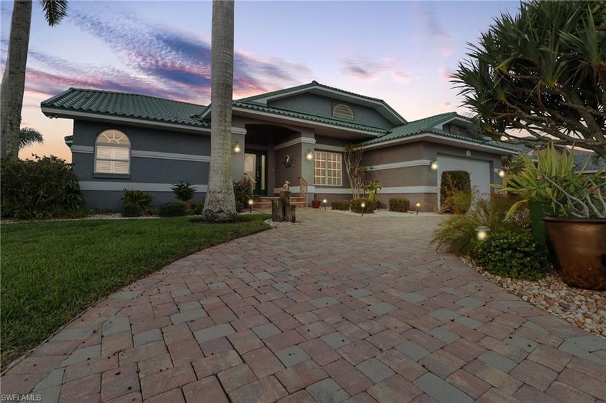 Stunning sunsets and relaxation by the water can be yours at this tranquil oasis found in this custom 3 bedroom, 2 bathroom SAILBOAT ACCESS SALTWATER CANAL FRONT POOL HOME in Punta Gorda Isles with full hurricane protection. Inside find exceptional views of the Western skies with wide waterfront views open through the home's sliding glass doors all across the back. The foyer is connected to the formal dining room and great room with the kitchen opened up through the breakfast bar area to this space and to the separate dinette overlooking the water. On right side, a large laundry room is tucked away near the garage entrance and two guest bedrooms are set off this same side for great privacy, sharing a beautifully updated guest bathroom with frameless shower enclosure, custom cabinets and granite counters with pool access. On the opposite side of this desirable split floor plan, find the spacious master suite with rich wood floors, his/hers closets, and a beautifully updated en suite bathroom with jacuzzi tub, separate shower with glass enclosure, and dual sinks in a custom vanity with custom cabinetry. Outside, find a recently redone pool with outdoor kitchen and storage closet.