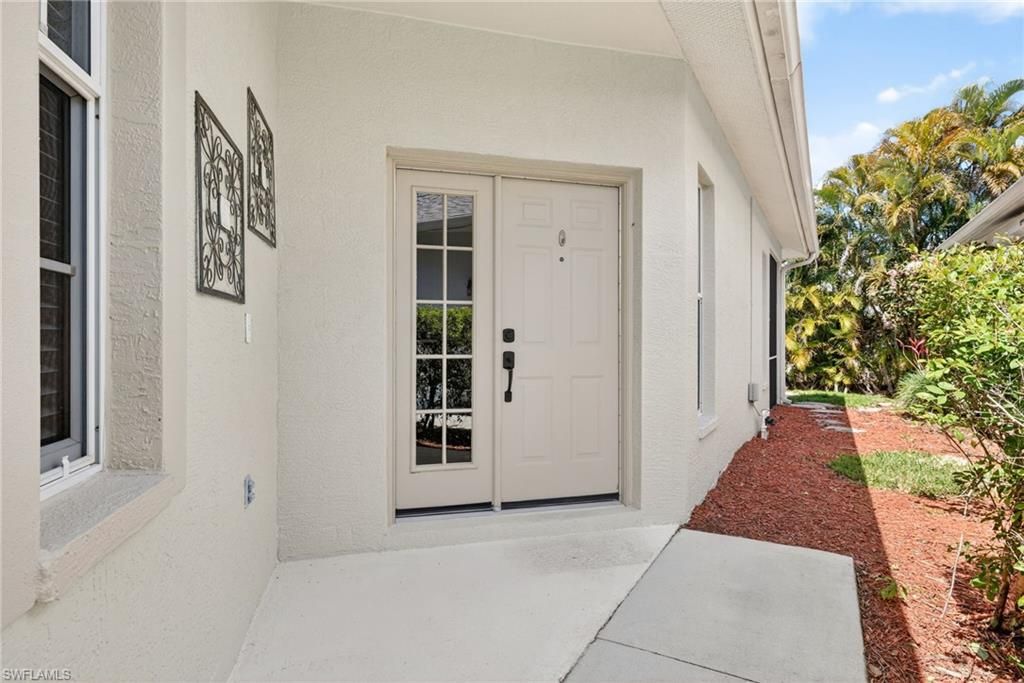 Photo of 599 Crossfield CIR #35, NAPLES, FL 34104 (MLS # 226011222)