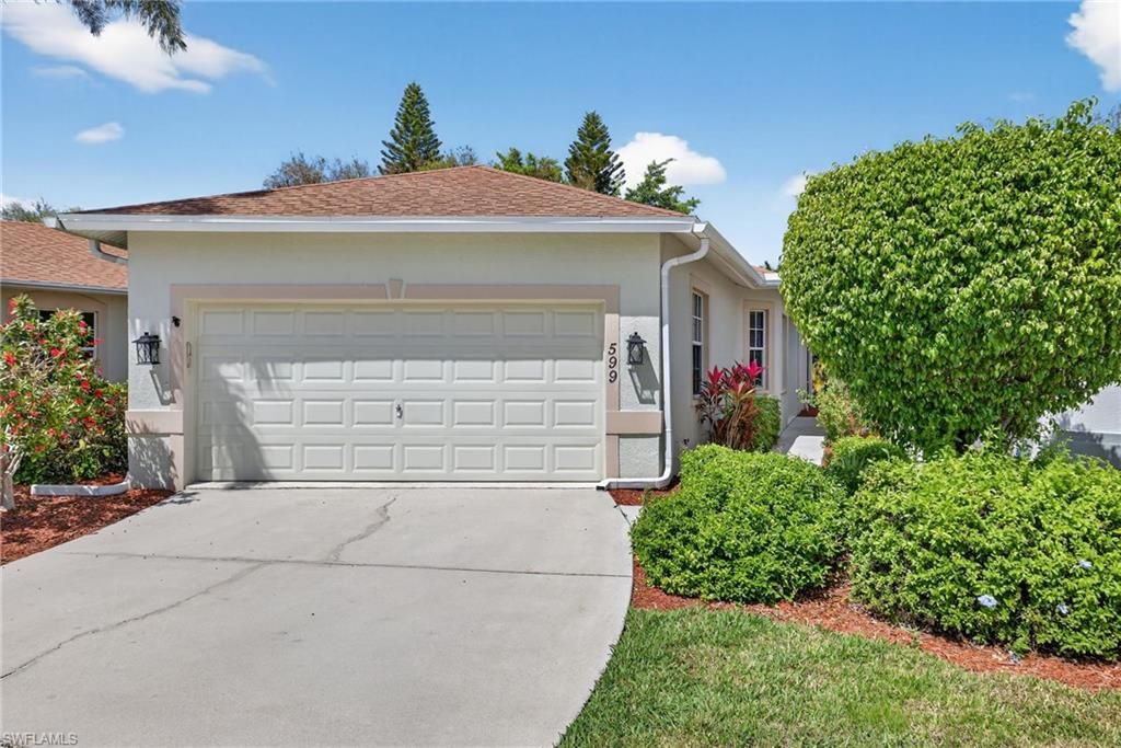 Photo of 599 Crossfield CIR #35, NAPLES, FL 34104 (MLS # 226011222)