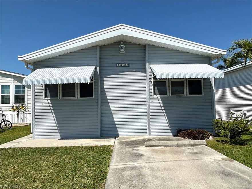 Welcome to this charming 1987 mobile home featuring a unique 1999 build-on, offering a spacious and versatile living experience with 2 bedrooms and 2 baths. The property boasts a durable metal roof and two water heaters, ensuring efficiency and reliability for your daily needs.

Step inside to discover an open living space that flows into the front kitchen, creating a warm and inviting atmosphere for entertaining or simply relaxing at home. The well-appointed layout includes two comfortable bedrooms and bathrooms, providing privacy and convenience for residents and guests. An adjacent laundry area provides additional storage solutions, perfect for keeping your space organized.

Located within a vibrant community, residents benefit from a full-time activity director who organizes a variety of recreational options, including pickleball, tennis, bocce, sand and water volleyball, and shuffleboard. Engage in social events such as dances, themed lunches, dinners, and craft or music groups, ensuring there’s never a dull moment.

For those who love the water, the community offers boat storage and a boat ramp leading to the Estero River, providing easy access to Estero Bay and the Gulf of America. This mobile home represents a wonderful opportunity to enjoy an active lifestyle in a friendly, engaging community. Don’t miss your chance to make this delightful home your own!