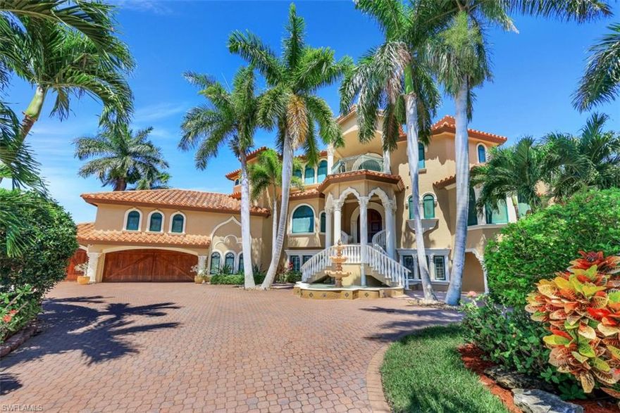 This magnificent, custom-built home is an absolute Masterpiece and offers one of the longest water views along the Caloosahatchee River!  This work of art combines exquisite design & materials that beautifully complement to produce an opulent and classy mansion, that is perfectly framed by the glistening River Views from every floor!  The ornate appointments include polished marble floors, solid custom South American mahogany double doors, solid Onyx slabs, columns imported from the Orient, double spiral staircase, multi-level crown moldings, cherry wood & marble fireplace, custom wall and ceiling murals, and much, much more!  Enjoy your mornings with the rising sun from any of the three, full-length balconies offering expansive vistas that accentuate the Florida lifestyle!  The massive outdoor living space wraps around a large spa that spills into a classic pool with a vanishing edge and the entire space is ideal for large gatherings!  The neighborhood is quiet and is in very close proximity to the Yacht Club area, Cape Beach and Ft. Myers.  Bring your most discerning clients to this gem and you all will be impressed.  Show & Sell today!