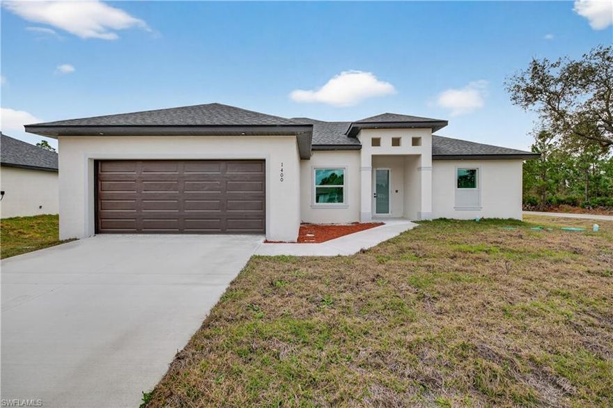 This move-in-ready property in Lehigh Acres, Florida, boasts several attractive features:
Impact Windows and Doors: The home is equipped with impact windows and doors throughout, a significant advantage in Florida's climate.
Modern Appliances: It includes stainless steel appliances and a washer and dryer, suggesting a modern and convenient living space.
Spacious Lot: The property sits on a 0.50-acre lot, providing ample space for outdoor living, including a potential patio area.