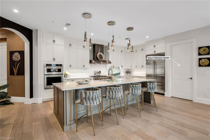 Seller intends to facilitate the transfer of a sports membership to the new owner; membership fee of $65,000 has been addressed by the seller - an incredible opportunity to step into luxury living with added value. Welcome to Talis Park’s most sought-after coach home floor plan, the Sienna Residence, offering 3,382 sq ft under air with a private elevator, 2-car garage, and a 527 sq ft lanai complete with a summer kitchen, perfect for entertaining. Natural gas enhances your cooking experience, while tranquil landscaping and water views create a serene backdrop. Talis Park is where time slows down, replacing the noise of everyday life with a refined, relaxed lifestyle centered around connection, wellness, and beauty. Located in Corsica, just steps from the Sports Complex with tennis, pickleball, swimming, bocce, and green space, and a short golf cart ride or walk to the Vyne House clubhouse, the included sports membership offers golf privileges November through April on the 100% Platinum Paspalum course designed by Greg Norman and Pete Dye. Inside, white oak flooring flows through the main living areas, complemented by hand-selected tile in all bathrooms, solid-core doors, impact-resistant windows and doors, and volume ceilings that enhance the home’s open, airy feel. The gourmet kitchen serves as the heart of the home, featuring high-end appliances, a built-in refrigerator, 48” gas cooktop, convection oven, beverage center, granite countertops, an oversized island perfect for gathering, and a large walkthrough pantry. The owner’s suite delivers a spa-like experience with a soaking tub, walk-in shower, and an oversized walk-in closet, while all guest bedrooms are private en-suites for ultimate comfort and privacy, and an oversized laundry room adds everyday convenience—bringing together luxury, lifestyle, and location in one exceptional offering.