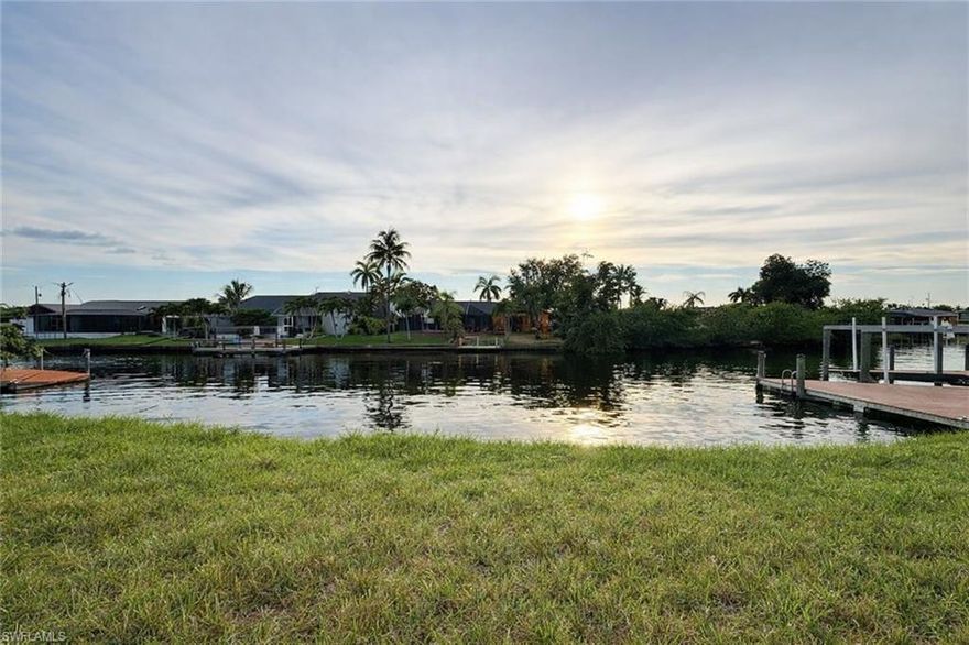 Great opportunity to build on this western exposure gulf access lot on the extra wide 100' Lotus Canal! Seawall is already in! Have plans for a single or double boat lift that can be built. The extra wide canal allows for a 25' dock which is perfect if you want an oversized lift and tiki area! Capture some of the most beautiful sunsets with partial intersecting canal views. Located in the Pelican neighborhood which is close to Lake Louis. Only just minutes away from some of the best shopping & dining Cape Coral has to offer!