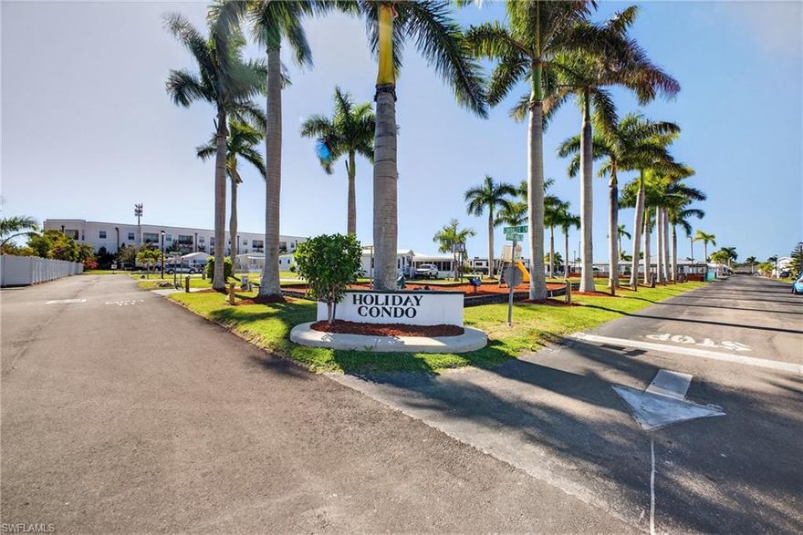 Are you looking for a great place to spend your winter months?  Looking for a great community to bring in a new park model?  Holiday Condo is the best place!  You own your land, NOT 55+,  and pet friendly.  Low monthly fees of $167 make living here so affordable.  The lot has water, sewer and electric ready for your RV or trailer.  Holiday Condo has two heated swimming pools, one indoors!  Tennis courts, pickleball courts, shuffleboard, bocce, horseshoes and lots of activities to keep you on the go.  You own your land!!!!!! Close to the beaches and shopping.