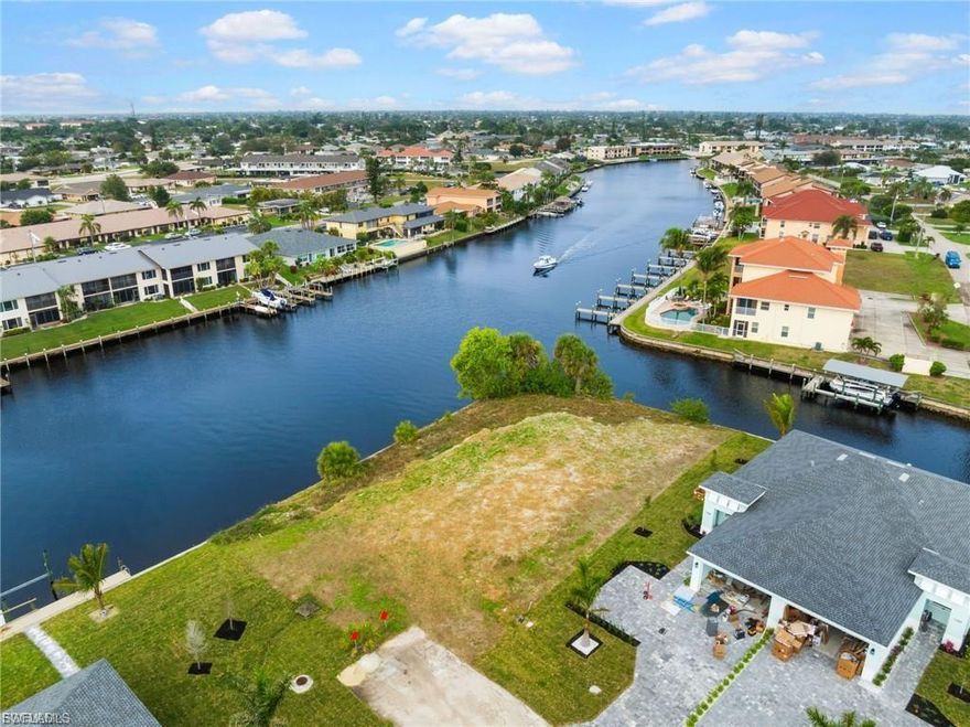 Hard to find such a great location, Intersection canals with a 200 foot wide Cape Coral waterway with Seawall in place, and a short distance to open water, Gulf of Mexico. Easy access to Cape Coral. Many Possibilities to construction: single family home, duplex, and the owner worked with the Architect for plans for a quadruplex. Feel free to ask for details. Buyer must explore lot viability and construction options.