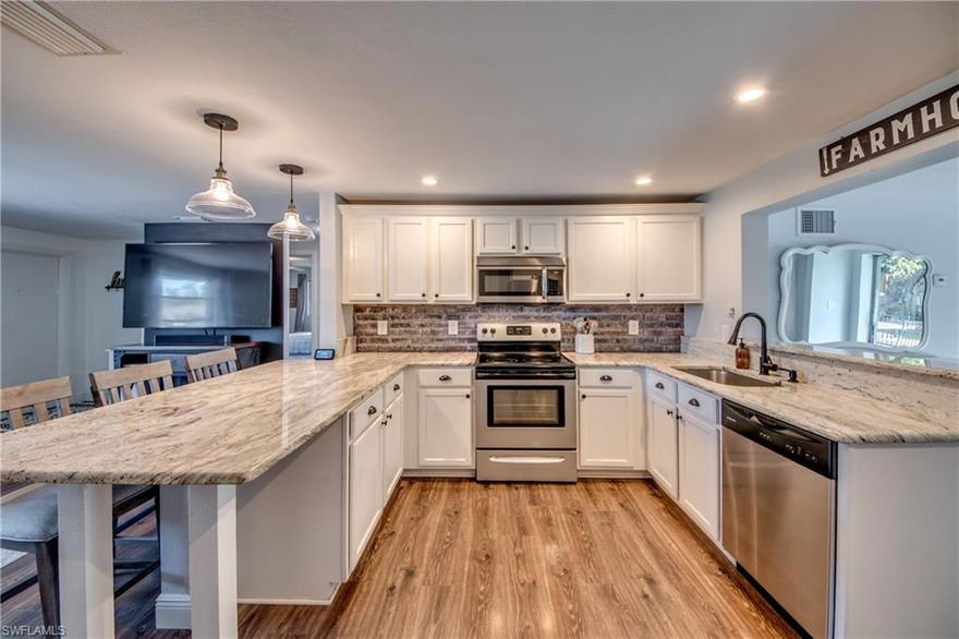 THIS IS A STUNNER! Highly desired McGregor Corridor home with total CHARM going on here! Tucked away on a nice quiet street. You’re going to LOVE this three bedroom two bath updated home home. Beautifully updated kitchen with white cabinets, gray and white granite, farmhouse sink, stainless reel appliances and large breakfast bar! Master suite with walk in closet and updated gorgeous master bath. Guest bath also updated in inviting colors and finished. Large fenced yard with southern exposure, fire pit, patio & plenty of room for a pool. Beautiful shade trees in yard and through out community! Many extras: New fence in 2018 with 2 gates, updated lights, faucets, storage shed, Ring doorbell, central water/sewer and NO HOA & NO FLOOD insurance required. Room to park boat or RV. Step into the classic character and charm of the McGregor corridor! Convenient and centrally located. Come discover all that Fort Myers has to offer! Famous beaches, outlet malls, attractions, boating, kayaking, birdwatching, Sanibel, Pine Island & so much more! Minutes from shopping, dining, banking, beaches, airport & more. That great southwest Florida lifestyle is affordably found here!