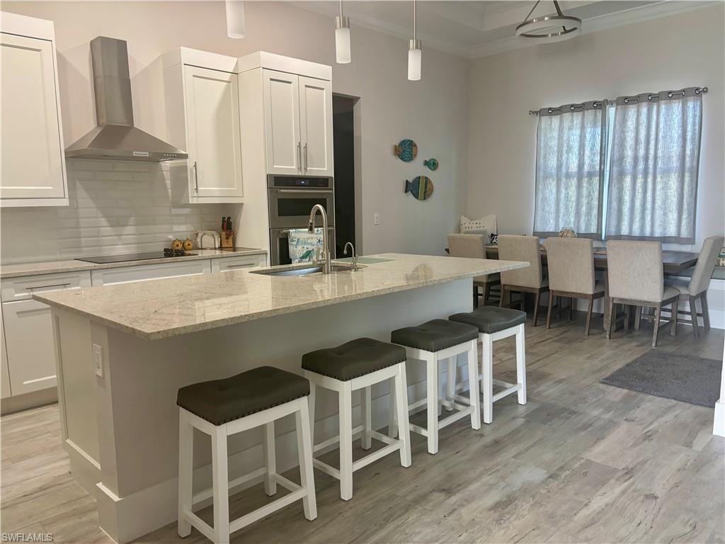 Photo of 350 Hazelcrest ST, MARCO ISLAND, FL 34145 (MLS # 226027607)