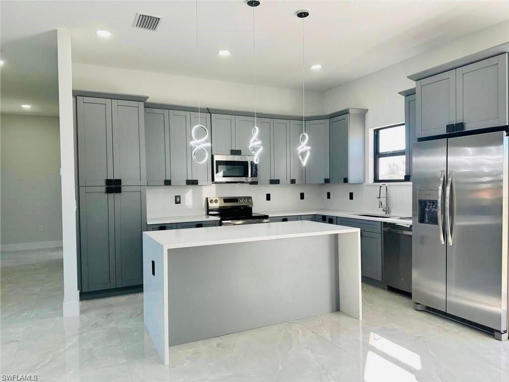 Photo of 3905 23rd ST SW, FORT MYERS, FL 33976 (MLS # 226015851)