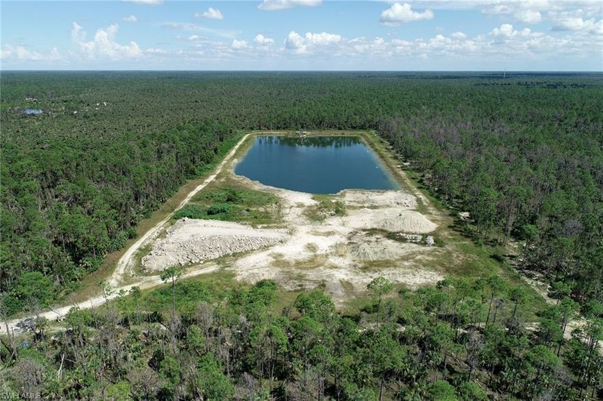 This could be the deal of a lifetime: roughly 14.7 acres for sale in Golden Gate Estates! Off the beaten path, off the grid and surrounded by preserve, this land has a beautiful lake and was used as an organic fishery. Three parcels are included in sale: 00312640006, 00312560005 and 00312600004. No well, septic or electric. Access by private road. *Agents, please see confidential remarks for more information.