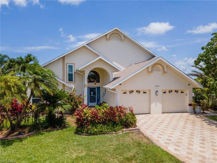 GULF ACCESS NOT IN A FLOOD ZONE, ASK ABOUT SELLER FINANCING Welcome to 1234 SE 13th Ave in beautiful Cape Coral — where waterfront living meets smart investment opportunity. This 3-bedroom + private in-law suite, 2.5-bath Gulf-access home offers over 2,100 square feet of living space and 100 feet of canal frontage with direct boating access to open water. Step inside to find a remodeled kitchen, spacious living and dining areas, tile flooring, and plenty of natural light. Major updates provide peace of mind, including a 2021 roof, 2019 A/C system, and a fully paid-off solar system for energy efficiency and lower utility bills. One of the standout features is the private 1-bedroom, 1-bath in-law suite with its own entrance — ideal for guests, multigenerational living, or rental income potential.Outside, enjoy the Florida lifestyle from your screened lanai overlooking the canal. Boaters will love the 10,000-lb boat lift and quick access to the river and Gulf. Even better — the property is located in a non-flood zone (Zone X), potentially saving you thousands on flood insurance. Situated in a desirable SE Cape Coral location close to shopping, dining, schools, and entertainment, this home offers the perfect combination of lifestyle, flexibility, and long-term value.