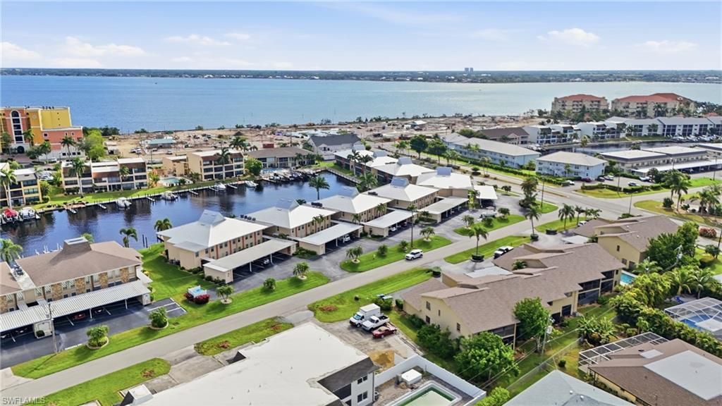 Photo of 1949 Beach PKWY #216, CAPE CORAL, FL 33904 (MLS # 2025016947)